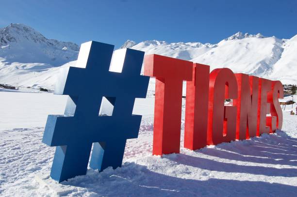 Snowy mountains France Tignes top blue sky